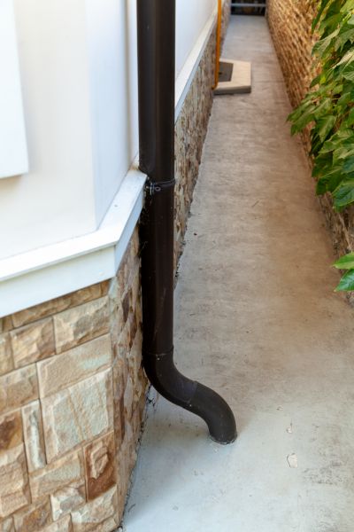 Cost of Underground Gutter Service in Webster