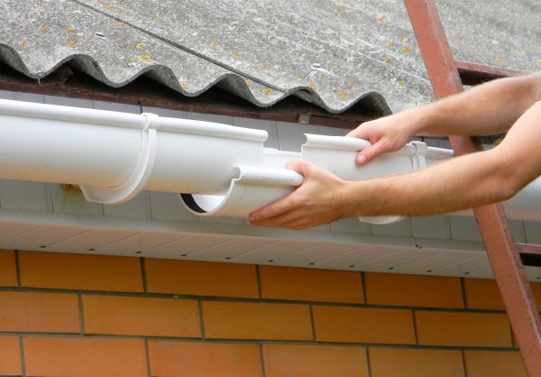 Cost of Gutter Hanging in Webster